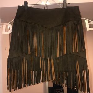 Faux suede skirt with fringe.